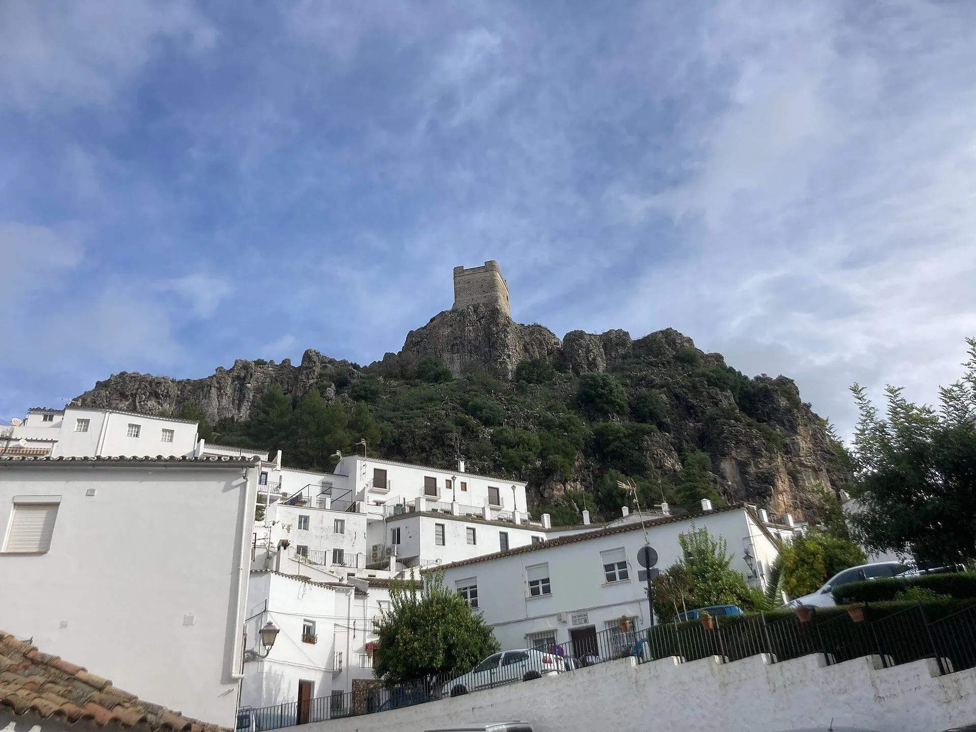 The tower of the Zahara de la Sierra castle on its rock above the white village